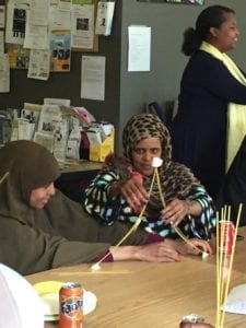 Teacher and students doing an experiment