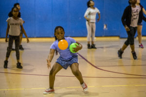 Child playing in gym class