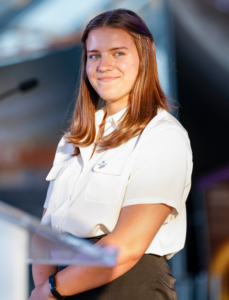 Young woman at podium