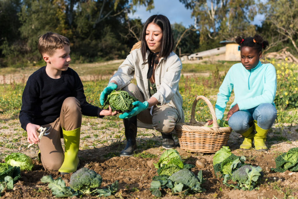kids gardening with adult