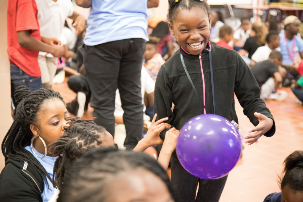 girl with purple ball