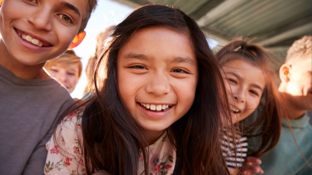 children smiling close to the camera
