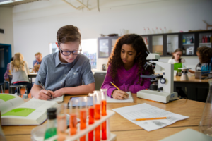 boy and girl in science class