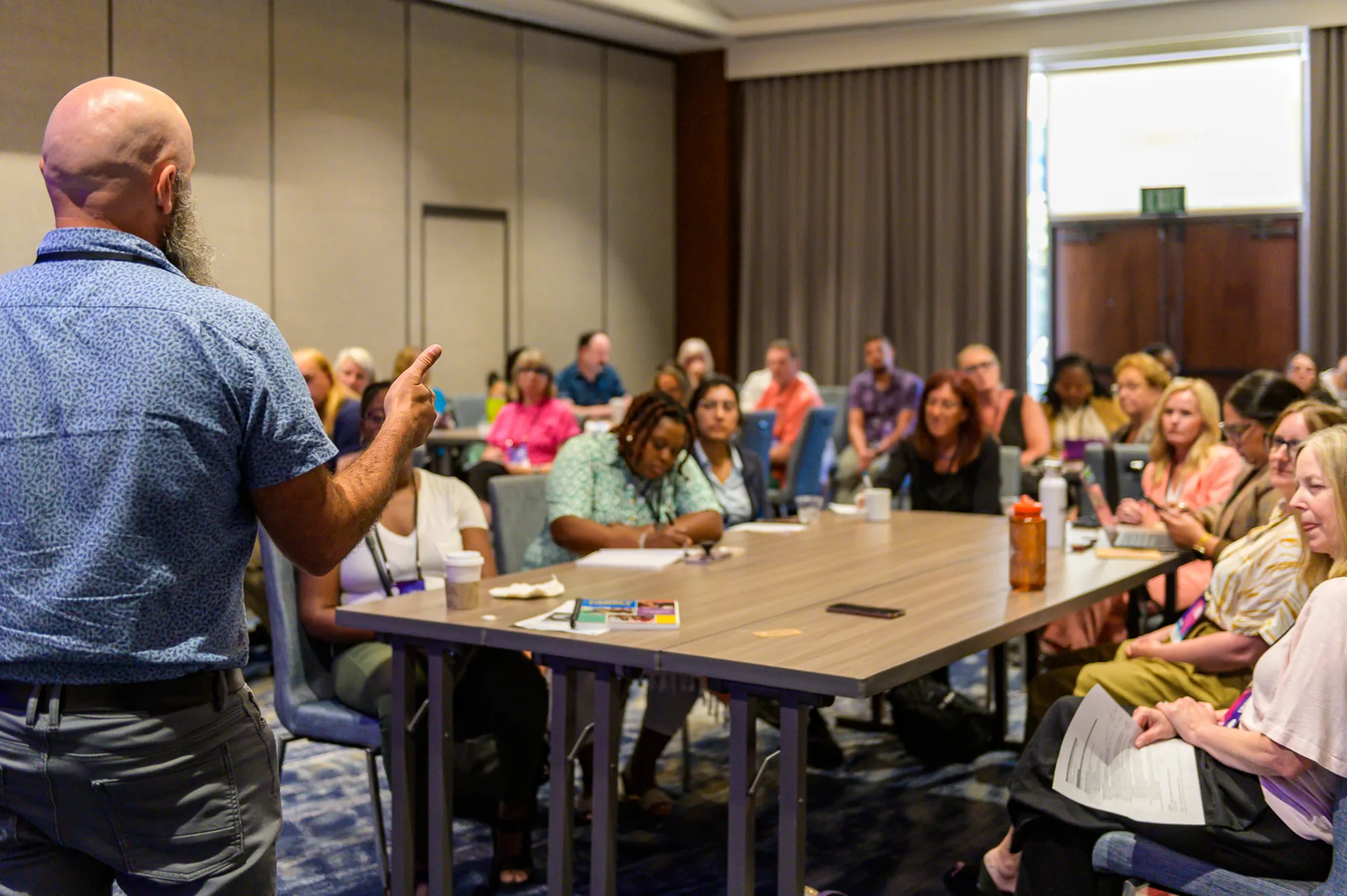 teacher speaks in front of class