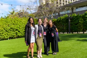 four girls at a conference
