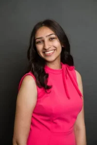 girl headshot in pink dress