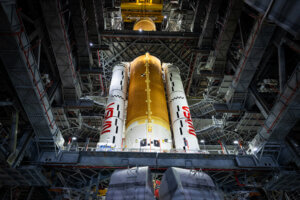 NASA’s Space Launch System core stage with solid rocket boosters for Artemis II inside Kennedy Space Center’s Vehicle Assembly Building, March 23, 2025.